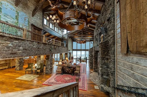 Branson real estate photography — grand living room with stone fireplace